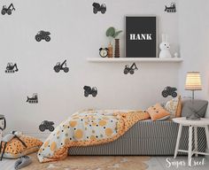 a child's bedroom with black and white wall decals