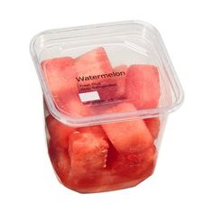 watermelon cubes in a plastic container on a white background with the words watermelon printed on it