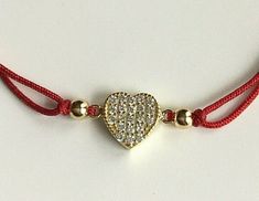 18k gold plated over 925 sterling silver heart red bracelet .adjustable . for love and happiness. --comes with free gift pouche. pulsera rojo de plata esterlina 925 con baño de oro corazon . ajustable. para amor y felicidad. --gratis bolsa de regalo. Red Cubic Zirconia Jewelry Gift, Red Dainty Jewelry For Mother's Day, Double Heart Bracelet Valentine's Day Gift, Red Heart Charm Fine Jewelry, Red Fine Jewelry With Heart Charm, Red Cubic Zirconia Jewelry For Mother's Day, Red Heart-shaped Cubic Zirconia Jewelry, Mother's Day Red Cubic Zirconia Jewelry, Red Heart-shaped Bracelets For Mother's Day