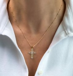 Womens Cross necklace, gold filled cross necklace, gold cross necklace, dainty jewelry, gifts for her, religious necklace, birthday gift Gold filled cross necklace  D E T A I L S: *1"  Gold filled cross pendant with Cubic Zirconia Stones *Gold filled Satellite or Cable chain- choose your perfect length at checkout  *Model wearing 18" length  Water & tarnish resistant!  Gold filled jewelry is durable & tarnish resistant.  Gold filled quality products are suitable for daily wear and is also water Dainty Crucifix Cross Necklace With Delicate Chain, Gold Cross Charm Necklaces In 14k Gold Filled, Yellow Gold Crucifix Necklace With Delicate Chain, 14k Gold Filled Cross Pendant Necklace As Gift, Delicate Cross Pendant Necklace For Gift, Gold Dainty Cross Pendant Charms, 14k Gold Filled Cross Necklace Gift, Gold Cross Necklace In 14k Gold Filled, Delicate Cross Necklace Perfect As A Gift