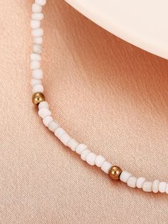 Color: White Gender: Women Material: PMMA Quantity: 1 piece Style: Fashionable Details: Beaded Type: Beaded IN Length 15.9-17.9 This data was obtained from manually measuring the product, it may be off by 1-2 CM. Beaded Choker With Round Beads For Beach, Beach Choker With Round Beads, Beaded Choker For The Beach, Beach Pearl Beaded Necklaces With Spacer Beads, Pearl Beaded Necklaces With Spacer Beads For Beach, Pearl Choker With Colorful Round Beads, White Beaded Necklace With Gold Beads For Summer, Pearl Choker With Round Beads, Trendy White Necklace With Spacer Beads