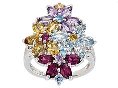 1.35ctw Oval Glacier Topaz™ & .16ctw Round Swiss Blue Topaz, 1.04ctw Oval & .08ct Raspberry Rhodolite, .99ctw Oval & .12ct Round Brazilian Citrine, .99ctw Oval & .06ct Round Lavender Amethyst Rhodium Over Sterling Silver Flower Ring. Measures Approximately .84"L x 1.12"W. Not Sizeable. Dazzling Oval Multi-stone Gemstones, Oval Multi-stone Gemstones, Dazzling Oval Multi-stone Cluster Ring, Dazzling Cluster Gemstone Jewelry, Multicolor Oval Gemstone With Center Stone, Fine Jewelry With Cluster Gemstone Accents, Fine Jewelry With Gemstone Cluster Accents, Multi-stone Cubic Zirconia Cluster Jewelry, Fine Jewelry Cluster Gemstones With Multi-stone