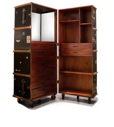 an open bookcase with two drawers and a mirror on the top, sitting next to each other