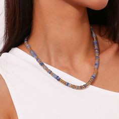 Add some playful bohemian vibes to your outfit with our Gemstone Rondelle Beaded Gold Necklace. Choose your favorite gemstone for a unique and ethnic touch. Perfect for everyday wear or special occasions. (Boho-chic never looked so good!) DETAILS & SIZE Finish: 18K gold plate Material: Stainless Steel, Gemstone Measurements: Beads: approx. 6.5mm; Chain: 18" + 2" extension Lobster Claw clasp Waterproof, tarnish-resistant, and nickel free Shop Necklaces for more options to layer with this! Bohemian Hand-strung Beaded Necklaces For Beach, Casual Beaded Jewelry For Festivals, Bohemian Gemstone Beaded Necklaces For Vacation, Bohemian Heishi Beads For Festival, Bohemian Hand-strung Beads For Vacation, Heishi Beads For Jewelry Making, Hippie Beaded Necklaces With Gemstone Beads For Beach, Hippie Style Gemstone Beaded Necklaces For The Beach, Bohemian Crystal Necklace With Colorful Beads For Festivals