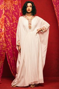 White crushed kaftan with placement floral motif thread work and gathered front. Comes with inner slip.
Components: 2
Fabric: Viscose Cotton
Neckline: Mandarin Collar
Color: White
Embroidered
Cuff sleeves
Gathered detail
 - Aza Fashions Kaftan For Women, Embroidered Kaftan, Designer Anarkali, Indian Fashion Designers, Fashion App, Collar Designs, Aesthetic Vintage, Indian Design, Mandarin Collar