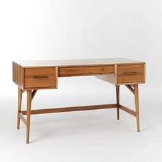 a wooden desk with two drawers on one side and an open drawer on the other