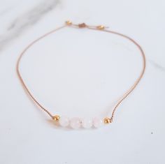 Rose Quartz Jewelry Adjustable Dainty Bracelet Beige Nylon Cord Water-Friendly Pair multiple styles together for stacked look! Rose Quartz Properties: Love, Compassion, Peace, Friendship Adjustable Rose Gold Beaded Friendship Bracelets, Adjustable Rose Gold Friendship Bracelet With Sliding Knot, Pink Adjustable Necklace For Friendship, Adjustable Rose Gold Necklace For Friendship, Adjustable Rose Gold Bracelets With Cord, Adjustable Rose Gold Cord Bracelet, Adjustable Rose Gold Friendship Bracelet, Adjustable Rose Gold Friendship Bracelet Gift, Adjustable Rose Quartz Jewelry In Rose Color