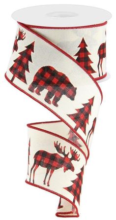 a white and red plaid ribbon with moose, trees and snowflakes on it