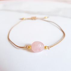 Rose Quartz Jewelry Adjustable Dainty Bracelet Beige Nylon Cord Water-Friendly Pair multiple styles together for stacked look! Rose Quartz Properties: Love, Compassion, Peace, Friendship Adjustable Rose Gold Beaded Friendship Bracelets, Adjustable Rose Gold Friendship Bracelet With Sliding Knot, Pink Friendship Bracelet With Adjustable Cord, Delicate Adjustable Rose Jewelry, Delicate Adjustable Rose-colored Jewelry, Adjustable Rose Gold Bracelets With Cord, Adjustable Rose Gold Cord Bracelet, Trendy Pink Jewelry With Adjustable Cord, Adjustable Rose Gold Friendship Bracelet