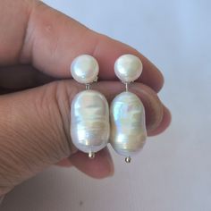 Welcome to my shop my dear friend. I hope you will like my jewelry, Please see the detail for this item: Pearl Jewelry: earrings Material: cultured freshwater pearl Size: around 8-8.5 mm & 13-18 mm Pearl Color: as the pictures Surface: with natural blemishes length: - thanks for looking! Have a good time! If you are not satisfied with your purchase, please kindly contact me and I will work with you to exchange the item or refund your money. About shipping: I will send out your order in 1-3 busin White Baroque Pearl Earrings As A Gift, Handmade White Pear-shaped Pearl Earrings, Pearl Jewelry Earrings, Baroque Pearl Earrings, White Freshwater Pearl, Earrings White, Silver Stud Earrings, Etsy Earrings Dangle, Pearl Color