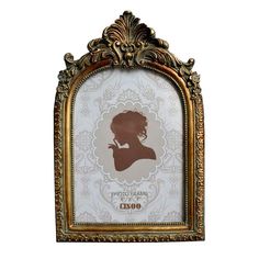 an ornate gold frame with a silhouette of a woman on the front and side, against a white background