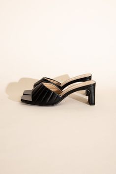 Step into relaxation and style with our Comfortable Wide Fit Mules featuring low block heels. These mules are designed for maximum comfort, catering to a wider fit while maintaining a fashionable edge. With the added support of low block heels, they become a versatile choice for effortless everyday wear, ensuring you stride with confidence and ease.Toe: Open toe, squareHeel shape: Block heelMaterial: SyntheticImported. Made in China Style: Casual Silhouette: N/A Embellishment: Low Heel Length: N Chic Slip-on Block Heels With Padded Heel, Classic Low Heel Mules With Padded Heel, Classic Mules With Padded Low Heel, Black Mules With Deep Heel Cup And Medium Width, Classic Black Kitten Heels For Summer, Modern Black Block Heels With Square Toe, Sleek Block Heel Kitten Heels For Spring, Sleek Spring Kitten Heels With Block Heel, Black Low Heel Mules With Deep Heel Cup