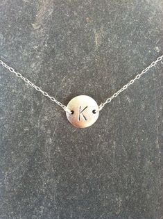 Tiny monogram bracelet. So cute and dainty can be worn every day with everything!The matte Silver plated charm has a brushed finish and is 1/2" in diameter. It has a delicate sterling silver chain on either side and closes with a sterling silver spring clasp. Your single initial can be stamped in 6mm Ariel font, or you can have two to three characters stamped in 3mm Ariel font with any of the combinations you see in the last photo. The letters can be either black (antiqued) or left plain. For an Tiny Bracelet, Initial Bracelet Silver, Bracelet Couples, Monogram Bracelet, Bracelet Initial, Couples Bracelet, Necklace Initial, Monogram Necklace, Initial Bracelet