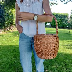 Wicker Basket Bag Artisan Made Made in Portugal Dimensions: Ø - 23 cm, H - 21 cm, H with handle - 42 cm Ø - 9,1 in, H - 8,3 in, H with handle - 16,5 in The dimensions may vary slightly. Brown Woven Shoulder Bag For Picnic, Bohemian Basket Bag For Picnic, Bohemian Basket Bags For Picnic, Brown Tote Shoulder Bag For Picnic, Brown Woven Bag For Picnic, Brown Woven Bags For Picnic, Bohemian Brown Bag For Picnic, Brown Tote Bag For Picnic, Handwoven Bags For Picnic