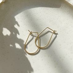 These 14k gold hoops are perfect for everyday wear. Named after the Greek goddess of wisdom and strength, these earrings will elevate your look each time you reach for them. Each purchase comes with an elegant, vegan leather box for storing + caring for your jewelry. DETAILS14k Solid Gold | 1 1/8" in length, 5/8" wide Minimalist 14k Gold Teardrop Huggie Earrings, Gold 14k Threader Earrings For Everyday, 14k Gold Hoop Earrings For Everyday Elegance, Gold 14k Hoop Earrings For Everyday, 14k Gold Hoop Earrings For Daily Wear, Everyday 14k Gold Threader Earrings, Everyday Yellow Gold Teardrop Huggie Earrings, 14k Gold Filled Yellow Gold Threader Earrings For Everyday, Gold Sterling Silver Hoop Earrings For Everyday Elegance