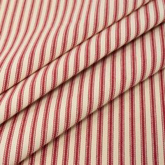 the red and white striped fabric is folded together