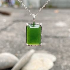 This Jade Necklace has a Natural Nephrite Jade Pendant. People believe that Green Stone Necklace is considered a necklace of luck. The Jade Necklace Silver is a suitable gift for a girl, a boy, or your best friend. Product Description - Gemstone: Natural Canadian Nephrite - Stone size: 9mm x 13.5mm x 4.5mm - Material: S925 Silver - Color: Light Green to Green. - Chain length: 18" - 20" adjustable (leave me a note if you need a longer chain). Jade Nephrite is a stone with a heart of healing, and Spiritual Rectangular Jade Jewelry, Jade Amulet Pendant Necklace, Rectangular Jade Gemstone Necklaces, Rectangular Jade Gemstone Necklace, Green Jade Amulet Necklace, Jade Amulet Necklaces With Gemstones, Jade Gemstone Amulet Necklaces, Jade Gemstone Amulet Necklace, Green Amulet Pendant Necklace