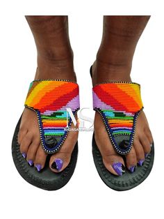 100% handmade using leather and fine beads. Masai beaded sandals are made using the pure original leather and quality African beads.They are inspired by the Masai community They are perfect for any occasion. True to size. We ship worldwide. Feel free to send me a convo for any clarifications Handmade Multicolor Barefoot Sandals For Vacation, Bohemian Multicolor Toe Ring Sandals With Round Toe, Adjustable Multicolor Toe Ring Sandals For Summer, Bohemian Beaded Closed Toe Sandals, Multicolor Open Toe Barefoot Sandals For Summer, Handmade Multicolor Sandals For Summer, Handmade T-strap Sandals With Toe Post For Vacation, Traditional Multicolor Barefoot Sandals For Vacation, Handmade T-strap Sandals With Open Toe For Vacation