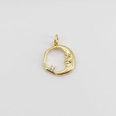 Moon Face Charm, 18K Gold Plated Moon Pendant, Tiny Moon Charms, 13mm, Jewelry Findings S20723 Quantity: 1pc/ 10pcs Size: 13x11.4mm Material: Brass, 18K real gold Celestial Half Moon Yellow Gold Jewelry, Yellow Gold Plated Moon Jewelry, Yellow Gold Moon-shaped Charm Jewelry, Yellow Gold Moon-shaped Jewelry With Charms, Celestial Moon-shaped Polished Jewelry, Gold Plated Moon Phase Jewelry, Yellow Gold Moon Phase Jewelry Round Shape, 14k Gold Sun And Moon Design Jewelry, Gold Plated Moon-shaped Jewelry With Sun And Moon Design