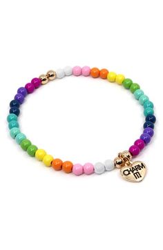 This beaded bracelet in a rainbow of colors is great for stacking or as a base for all her pretty charms (sold separately). 1/8" band width; 1/4" x 1/4" charm Elastic band Metal/enamel Imported Kids' Wear Butterfly Black And White, Charm It, Wrist Stacks, Pastel Beads, Rainbow Beads, Beaded Stretch Bracelet, Girls Jewelry, The Thing, A Rainbow