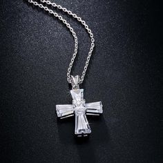 Love the New Elegant Cubic Zirconia Cross Necklace? Sometimes You Never Know The True Value Of A Moment Until It Becomes A Memory. And then you have this beautiful piece of jewelry to remind you of that special moment wherever you go. When was the last time you treated yourself to a lovely gift that reminds you of the most important events in your life? Carry your cross every day and remember what true love looks like. The New Elegant Cubic Zirconia Cross Necklace is carefully crafted with coppe Fine Jewelry Cubic Zirconia For Anniversary Gift, Crystal Cross Clavicle Chain Jewelry, Crystal Clavicle Chain With Cross Shape, Fine Jewelry Cubic Zirconia For Anniversary, Crystal Cross Clavicle Chain, Fine Cubic Zirconia Jewelry For Anniversary, Crystal Cross Pendant Clavicle Chain, Crystal Clavicle Chain With Cross Pendant, Anniversary Cross Pendant Necklace With Cubic Zirconia