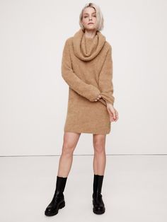 An invitation to play with proportions, this soft and warm sweater dress is cut with an oversized silhouette and a dramatic, funnel neck so you can drape and style as you please.  For fabric, we reached for one of our favorite fuzzy yarns, spun from a blend of luxurious alpaca.  Oversized fit.  Funnel neck.  Slip-on styling.  Unlined.  Oversized fit.  Long sleeves.  Above-knee length.  Model: Size S, 5'10" (178cm). Riddling Rack, Cinnamon Dolce Latte, Invitation To Play, Warm Sweater, Warm Sweaters, Oversized Silhouette, Funnel Neck, Funnel, Oversized Fits