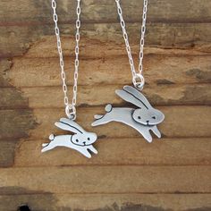 "This cute set is a great gift for your friends with kids.. or for your pregnant friends who can wear them both together! They are made from sterling silver, the mom measures 3/4\" high and the baby 1/2\" high. The \"baby\" hangs from a 16\" silver-plated cable chain and the \"mom\" hangs from an 18\" silver-plated cable chain. If you want two kids: https://www.etsy.com/listing/87244713/two-kids-famiy-necklace To see the \"mother\" necklace: https://www.etsy.com/listing/527507465/sterling-flying Bunny Necklace, Mother Necklace, Pregnant Friends, Mother Child, Two Kids, Daughter Necklace, Mothers Necklace, Cute Sets, Perfect Gift For Mom