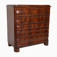 an antique chest of drawers with wooden handles and wood grained finish, on white background