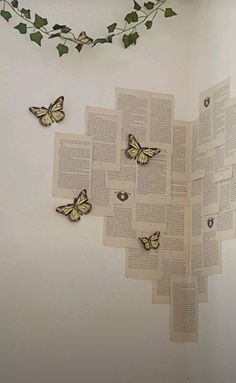 some butterflies are flying over an open book