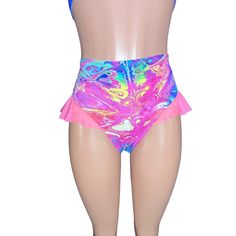 Introducing our Rave Bikini Bottom with Mesh Ruffle, the ultimate blend of sass and style for the dance floor diva in you! These hot pants are designed to make a statement with their high-thigh cut and super cheeky design, guaranteed to turn heads and set the dance floor on fire. The highlight of these hot pants is the mesh ruffle detailing on the sides, adding a touch of flirtatious flair and playful movement to your outfit. Whether you're grooving to the beat at a rave, hitting the club scene, High Waist Shorts For Cheerleading In Summer, Fitted High Waist Shorts For Club, Fitted High Waist Club Shorts, Flirty High-waisted Fitted Shorts, Flirty High Waist Shorts, Trendy High Waist Bottoms For Festivals, Fitted Disco Swimwear For Club, Disco Style Fitted Swimwear For Club, High Waist Summer Club Bottoms