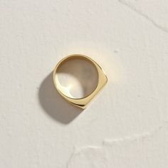 Our brand new 18K Gold Plated Level Ring. Beautifully flat, with a lovely precision feeling when worn, especially stacked with your other favourites, or just on her own, as a subtle addition to your outfit. When you're not wearing this piece, tuck it away in your very own Milou jewellery box provided. Stainless Steel, plated with 18K Gold Waterproof (Tarnish Resistant) Natural Linen Milou Jewellery Box Included For ring sizing, please see our Size Guide for details FREE (WORLDWIDE) SHIPPING Everyday Gold Plated Open Signet Ring, Gold Initial Open Ring For Everyday, Gold Open Ring With Initial For Everyday Wear, Tarnish Resistant Wide Band Open Ring For Everyday, Minimalist Adjustable Wide Band Ring, Tarnish Resistant, Simple Gold Signet Ring For Everyday, Modern Gold Initial Ring With Round Band, Gold Signet Ring For Everyday, Minimalist Gold Signet Ring For Everyday