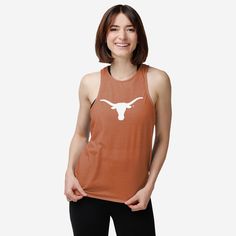 Fandom never looked so good. Whether you're at the game, hitting the beach, or getting your epic workout on at the gym, this Texas Longhorns Women's Colorblock Tie-Breaker Sleeveless Top is sure to make you the most passionate and best-dressed fan around. Features Team-colored design with team logo display on chest so everyone knows who you're rooting for Reverse side with two team-colored tie-able ends for double the awesome Wordmark team name display on reverse side so you can show off your te Sporty Sweat-resistant Tank Top For Sports Events, Athletic Fit Sleeveless Tank Top, Stretch Sleeveless Tank Top For Sports Events, Summer Racerback Muscle Tee For Training, Sweat-resistant Sleeveless Tops For Sports Events, Summer Training Muscle Tee With Racerback, Casual Sweat Resistant Tank Top For Sports, Athletic Fit Sleeveless Tank Top For Sports, Sporty Athletic Fit Tank Top For Sports Events