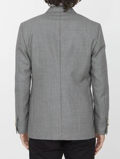 Double-breasted jacket in grey wool. It features peaked lapels, front four-button closure, two front welt pockets, a welt pocket on chest and buttoned cuffs. Regular fit. The model is 184cm tall and wears size IT 48.Size nationality: IT Product number: 37176789 Product code: 690661571901 Composition: 100% WOOL Timeless Suits With Button Closure And Lapel Collar, Luxury Notch Lapel Blazer With Button Closure, Wool Button-up Business Blazer, Wool Button-up Blazer For Business, Luxury Blazer With Notch Lapel And Button Closure, Timeless Tailored Blazer With Button Closure, Classic Double Breasted Suit For Fall With Hidden Buttons, Classic Double Breasted Suit For Fall, Classic Formal Button-up Blazer