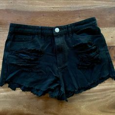 Black Hi-Rise Ripped Shorts. Great Condition, Never Worn. Black Grunge Bottoms For Night Out, Distressed High Rise Black Bottoms, Grunge Cotton Bottoms For Night Out, Black Mid-rise Shorts For Night Out, Edgy Black Bottoms With Built-in Shorts, Black High-waisted Cotton Shorts, High-waisted Cotton Shorts For Night Out, Black Cotton Jean Shorts For Night Out, Cotton High-waisted Shorts For Night Out