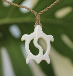 Beautifully handcrafted Buffalo bone handcrafted pendant on woven adjustable jute neck cord. Polished and detailed to bring out the best in each design. Set includes one of each Fish hook, Whale Tail and Petroglyph Honu! Individually boxed to give as gifts. Great quality and style at an affordable low price! Our buffalo bone pendants are great in and out of the water so you never have to take them off. Braided cording is adjustable so it fits from keiki to adults. Great for men and women, boys a Artisan Adjustable Natural Color Necklaces, Artisan Adjustable Natural Necklaces, Artisan Adjustable Natural Necklace, Traditional Natural Color Necklace For Gift, Traditional Necklace As A Gift, Traditional Adjustable Rectangular Necklaces, Traditional Natural Jewelry For Gifts, Artisan Jewelry With Adjustable Cord As Gift, Traditional Natural Jewelry As A Gift