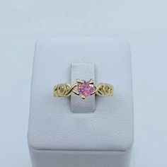 ❤️ Real 10k Gold Ring Band pink heart with XOX ❤️ Size 6 ❤️ Women's engagement / wedding ring  / birthday October birthstone  ❤️ New Fine Jewelry  ❤️ Pink heart Checkout my other jewelry  ❤️ Anillo de Oro de 10k Banda con corazón ❤️ Sortija de mujer tamaño 6.5 ❤️ Piedra zirconia Rosa  y blanca  ❤️ Joyería nueva SKU 41472 Pink Round Cut Diamond Ring For Anniversary, Gold Heart Promise Ring With Center Stone, Pink Diamond Ring With Birthstone, Pink Diamond Birthstone Ring, Pink Diamond Promise Ring In Fine Jewelry Style, Pink Diamond Ring With Birthstone In Round Shape, Pink Gold Promise Ring, Gold Heart Ring With Accent Stones For Promise, Gold Heart Ring With Center Stone For Promise