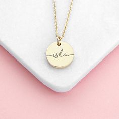 Our luxury personalised disc necklace is a beautiful yet simple piece of jewellery for her that she'll love wearing every day. It will perfectly compliment any outfit and is sure to wow her friends with its effortless beauty and quality craftsmanship. It features a cute little disc that you can personalise with a name or initial - this will be written in a lower case script font as standard. Your personalisation will be meticulously engraved by our dedicated team of creative specialists creating Minimalist Round Disc Initial Necklace For Gift, Minimalist Round Disc Initial Necklace As Gift, Simple Personalized Charm Necklace As Gift For Her, Minimalist Round Pendant Coin Necklace As Gift, Minimalist Personalized Round Disc Charm Necklaces, Minimalist Initial Round Disc Necklace For Personalized Gift, Minimalist Round Disc Initial Necklace As Personalized Gift, Minimalist Personalized Charm Necklace For Her, Personalized Minimalist Charm Necklaces For Her