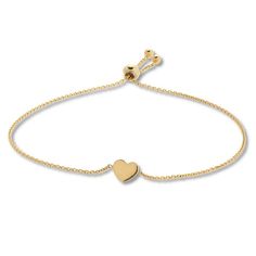 This charming bolo bracelet for her features a 14K yellow gold heart. The bracelet adjusts with the sliding bolo clasp. Adjustable Yellow Gold Minimalist Heart Bracelet, Adjustable Minimalist Yellow Gold Heart Bracelet, Dainty Gold Bracelet For Valentine's Day, Dainty Adjustable Gold Bracelet For Valentine's Day, Classic Adjustable Bracelets With Heart Charm, Adjustable Dainty Gold Bracelet For Valentine's Day, Classic Adjustable Bracelet With Heart Charm, Classic Adjustable Jewelry With Heart Charm, Classic Adjustable Heart Charm Jewelry