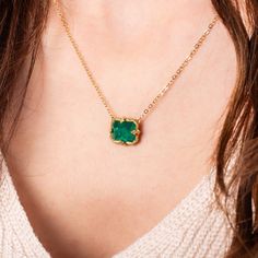 This pendant features a petite rectangular Emerald, with beautiful facets. This vibrant, one-of-a-kind stone is set in our signature handmade gold bezel pendant with braided detail and suspended from a matching gold chain. One of a Kind. Technical Details Metal: 18k yellow goldEmerald: 5.21 cts. Pendant Size: 10 x 12mmChain: can be worn at 16" and 18"Closure: lobster claspHandmade in New YorkStyle # N-3162-EM Luxury Oval Emerald Necklace With Natural Stones, Luxury Oval Emerald Birthstone Necklace, Luxury Rectangular Pendant Gemstone Jewelry, Luxury Necklaces With Rectangular Gemstone Pendant, Luxury Gold Briolette Emerald Necklace, Luxury Bezel Set Emerald Necklace For Women, Luxury Rectangular Gemstone Necklace, Luxury Briolette Emerald Necklace, Luxury Emerald Gemstone Necklace With Rectangular Pendant