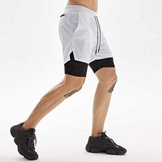 White Nylon Athletic Shorts With Built-in Shorts, Stretch Athletic Shorts With Elastic Side Panels, Stretch Athletic Shorts With Elastic Side Panels For Gym, Summer Sportswear Athletic Shorts With High Stretch, White Training Bottoms With Elastic Side Panels, Cotton Training Bottoms For Summer, Summer Cotton Training Bottoms, High Stretch Shorts For Summer Sports, Nylon Sportswear Shorts For Summer