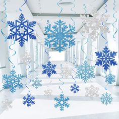 PRICES MAY VARY. Abundant Snowflake Decorations:This winter wonderland decorations include 30 pcs hanging snowflake decorations and 8 pcs hanging swirls, it can bring you a winter atmosphere, add bright colors to Christmas celebrations and leave unforgettable memories Premium Quality: The frozen party decorations are made of quality foil and glitter paper card which is thick, stable, reusable and not easy to deform or break,the hanging swirls are soft,non-toxic, safe to use, not fragile and not easy to bend Unique Snowflake Design: The snowflake decorations are designed with fine double-sided print in different styles, featured with blue white-4 colors that can fully decorate winter wonderland christmas decorations and make your party more attractive Wide Applications: This winter wonderla Winter Wonderland Themed Party, Ceiling Streamers, Easy Paper Crafts For Kids, Winter Wonderland Party Theme, Christmas Ceiling Decorations, Frozen Decorations, Wonderland Party Decorations, Christmas Snowflakes Decorations, Winter Wonderland Decorations