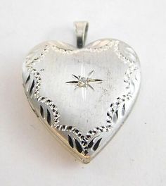 Vintage Sterling Silver Natural Diamond Heart Pendant Locket 925 3.4g 1 Inch | eBay Victorian Jewelry With Heart Charm For Anniversary, Classic Double Heart Engraved Jewelry, Classic Engraved Double Heart Jewelry, Vintage Silver Jewelry For Valentine's Day, Valentine's Day Silver Formal Jewelry, Antique Silver Heart Locket Jewelry, Antique Silver Engraved Heart Jewelry, Victorian Jewelry With Hallmark For Valentine's Day, Classic Heart Jewelry For Collectibles