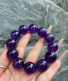 Material:Purple Amethyst Quartz beads size : Approx 19mm quantity: one strand  6mm approx 29 pcs one strands 7mm approx25 pcs one strands 8mm approx 22 pcs one strands 9mm approx 21pcs one strands 10mm approx 19 pcs one strands 11mm approx 18pcs one strands 12mm approx 16 pcs one strands 13mm approx 16 pcs one strands 14mm approx 15 pcs one strands 15mm approx 14pcs one strands 16mm approx 14 pcs one strands 17mm approx 13pcs one strands 18mm approx 13pcs one strands 19mm approx 12pcs one strand Purple Board, Bracelet Beaded, Amethyst Quartz, Bracelet Jewelry, Purple Amethyst, Colour Tone, Natural Crystals, Handmade Bracelets, Beaded Bracelet