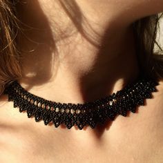 This handmade black lace choker necklace is made of the highest quality glass seeds and glass crystal beads, carefully hand-woven! It fits perfectly around your neck thanks to its stainless steel extension chain. Gothic elegant collar necklace is a beautiful collar necklace that you can use in all seasons and is compatible with all your clothes! It is a stylish handmade women's accessory for you and your loved ones! It is a black crystal goth necklace guaranteed to get all the compliments! You c Black Faceted Beads Choker, Black Faceted Beads Choker As Gift, Black Choker With Faceted Beads As Gift, Black Round Beads With Bead Caps, Black Beaded Choker For Jewelry Making, Black Beaded Choker As Gift, Adjustable Black Jewelry With Bead Caps, Black Bohemian Crystal Choker Necklace, Handmade Crystal Choker Necklace For Party