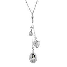 A trio of vintage-inspired charms is held by a lobster clasp on a silver-toned chain allowing you to create a custom look. The charms include a large oval-shaped locket accented with a costume pearl, a heart-shaped locket, and a small oval-shaped locket accented with clear crystal. Dainty and stylish and perfect for everyday wear. A trio of vintage-inspired charms is held by a lobster clasp on a silver-toned chain allowing you to create a custom look. The charms include a large oval-shaped locke Heart Locket Necklace Silver, Silver Locket Necklace, 1928 Jewelry, Heart Locket Necklace, Vintage Inspired Jewelry, Cameo Jewelry, Necklace Online, Heart Locket, Jewelry Companies