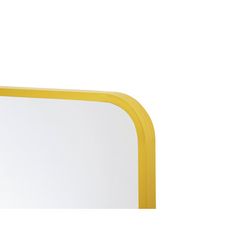 a mirror with a yellow frame is shown against a white background and the reflection has been taken from it