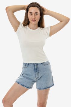 This versatile t-shirt is made of our 1x1 combed cotton baby rib and has been garment dyed to match our bestselling styles. This top has a feminine cut with cap sleeves and a crew neckline finished with tasteful binding. Semi-fitted with a flattering mid-length cut. This 100% cotton has been garment dyed and is shrink-free! Made in the USA with US-grown cotton by workers earning fair wages. This item is a garment dye product. Garment dye items can be distinguished by “GD” at the end of their sty Denim Short Jumpsuit, Jumpsuit Jacket, T Shirt For Women, Crew Neck Shirt, Cotton Baby, Festival Wear, Cotton Style, Cap Sleeve, Combed Cotton