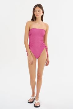 The ZARINA Strapless Swimsuit is an elegant addition to your beachwear repertoire. Crafted with sophistication and comfort in mind, it offers adjustable self-cords on the sides and anti-slip elastic at the top edge. The delicate ruching side details and crinkle fabric elegantly contours your silhouette as you bask in seaside splendor. Strapless Swimsuit, Crinkle Fabric, Swim Accessories, Swim Top, Skirt Pants, Dress Accessories, Dress Pants, Best Sellers, Dress Skirt