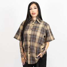 Introducing the Short Sleeve Checker Flannel Shirt! Our lightweight cotton/poly blend is extremely comfortable and provides breathability! This shirt is for both men and women Cotton/Polyester blend Manufactured by FB County Breathable fabric Fb County, Brown Flannel, Chicana Style, Checkered Shirt, Blue White And Black, Flannel Shirt, Shirts For Girls, Grey And White, Brown And Grey