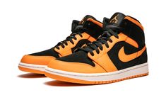 The Air Jordan 1 Mid never disappoints with versatile options and endless color combinations.  This particular silhouette features the brand’s “Orange Peel” colorway with classic black to provide the ultimate in contrast.  Black dresses the sneaker’s upper, tongue, laces and Jordan ball-and-wings logo, while orange is seen on the leather overlays, Nike Swoosh, and outsole.  With ample cushioning and a lot of style, the Air Jordan 1 Mid is a sneaker fan favorite. Jordan 1 Mid Orange, Air Jordan 1 Mid Orange, Jordan Orange, Air Jordan 1 Retro Mid, Jordan 1 Retro Mid, Nike Air Jordan 1 Retro, Wings Logo, Stadium Goods, Nike Swoosh